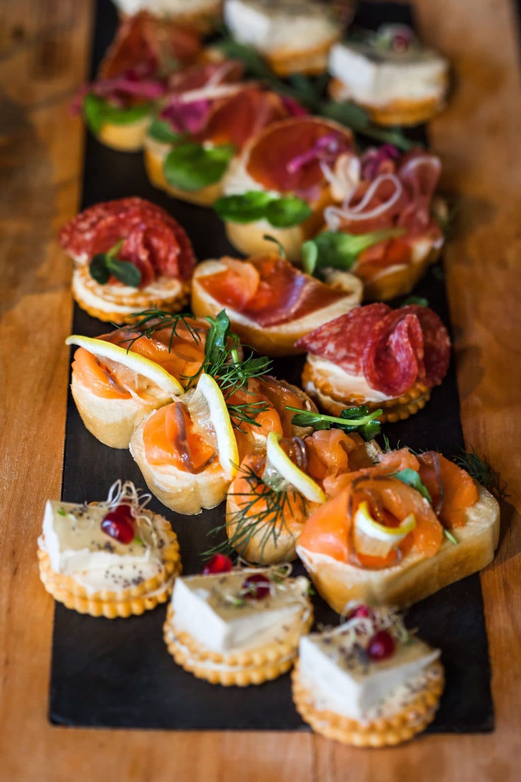 Tapas board with ham, salmon and cheese