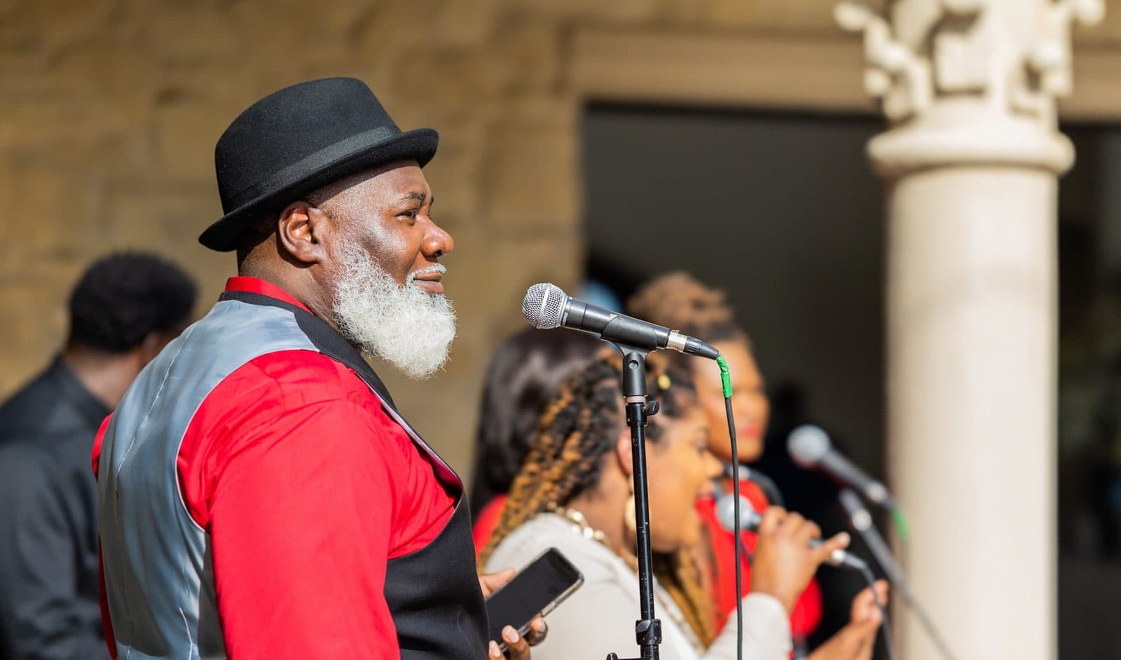 Gospel singers at their microphones