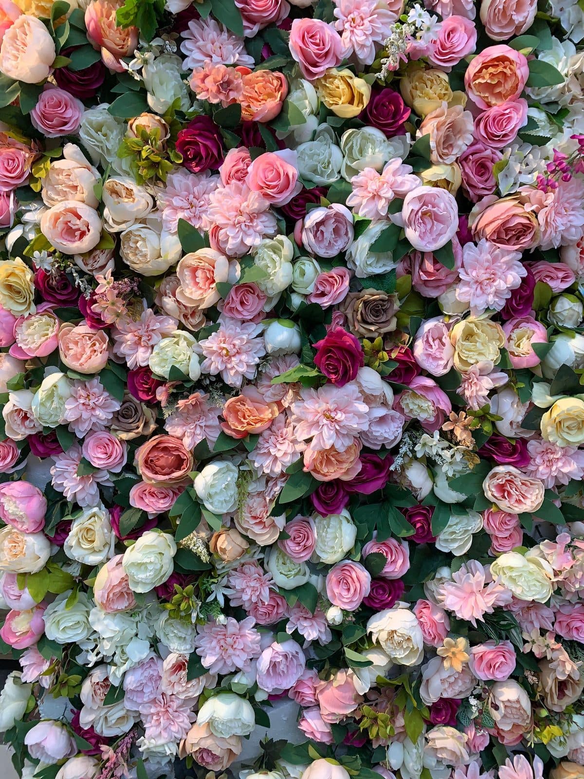 Wall of pink, white and purple flowers