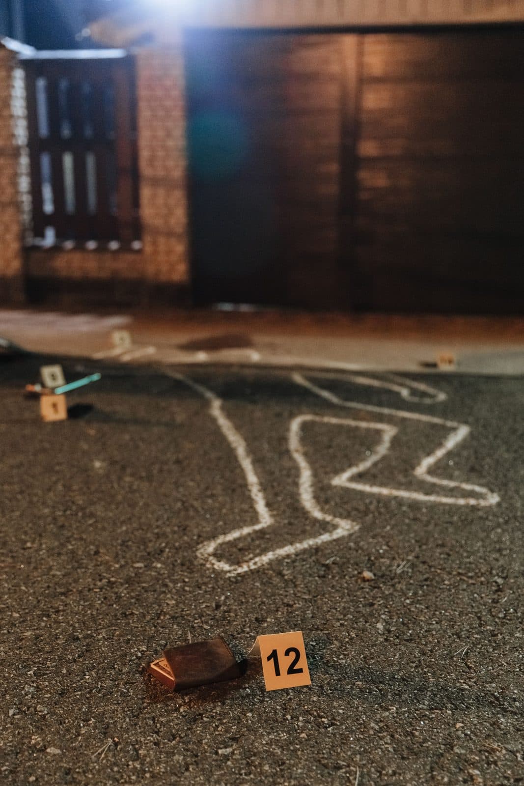 Chalk outline with evidence markers