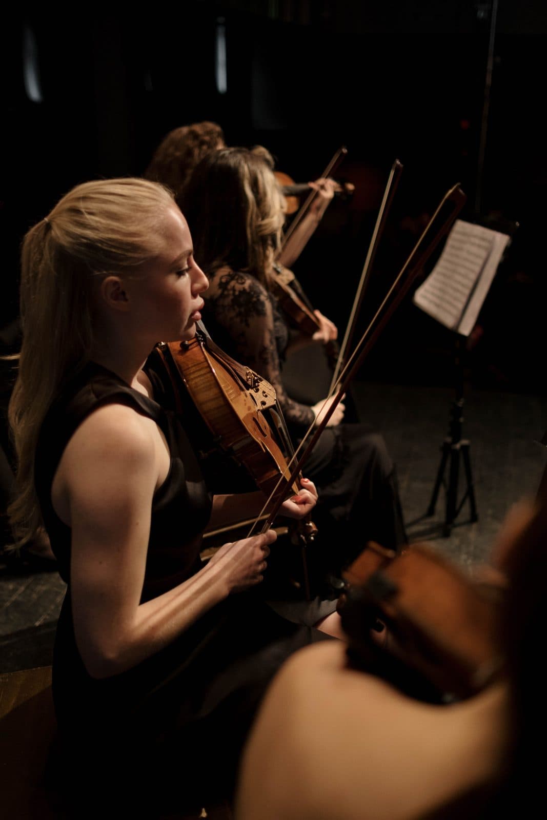 String quartet violinists performing