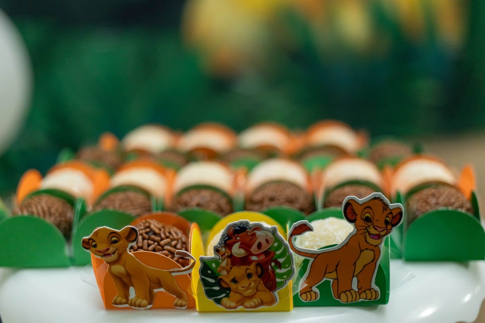 Children's party treats in decorated boxes
